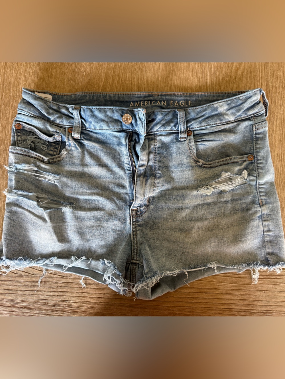 American Eagle Next Level Stretch High Waist Light Wash Denim Cutoff Shorts - Picture 6 of 6